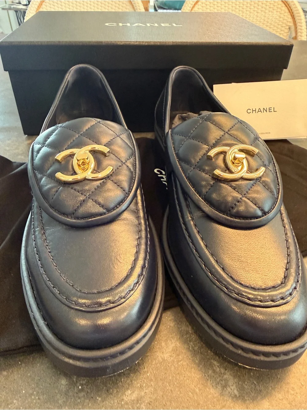 CHANEL Navy Quilted Leather Loafers with Gold CC Medallion